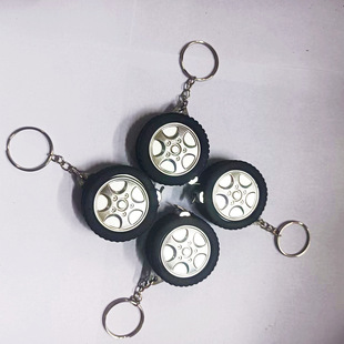 Factory wholesale small tape measure keychain 1 meter portable mini steel ruler pendant automatic retractable gift ruler tire