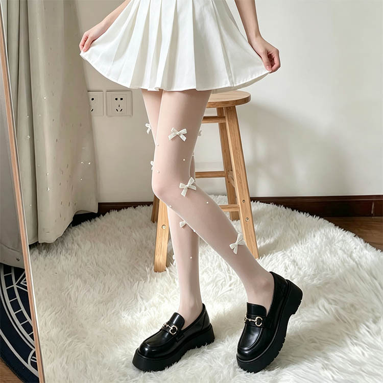 Japanese-style, pure and innocent white sheer stockings with a ballet-inspired design, featuring a three-dimensional bow and pearl embellishments, creating a sweet and lolita-inspired look; thin and lightweight