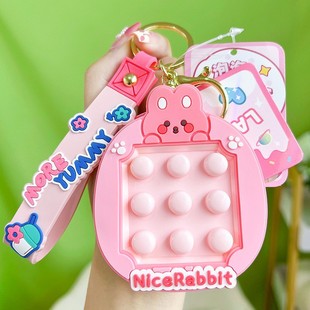 Genuine cartoon little monster doll pinch music keychain creative Big Ear dog car bag pendant gift wholesale