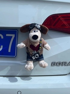 Car-mounted shield decoration wiper car interior ornaments doll turn signal 2024 new pilot dog cute