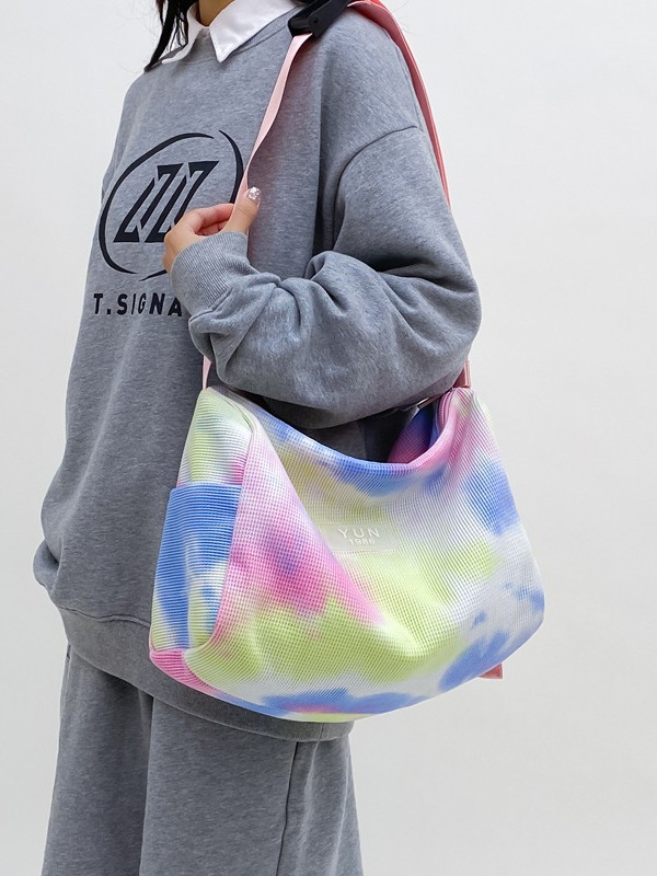Large capacity, stylish, color-blocked, high-quality crossbody bag for outdoor travel and storage.