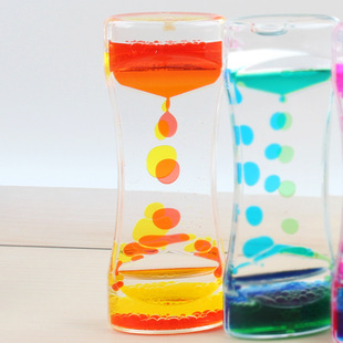 2022 Creative Fashion Two-color Oil Spill Toys Dynamic Oil Drops Beautiful Waist Hourglass Crafts Ornaments Home Gift Factory