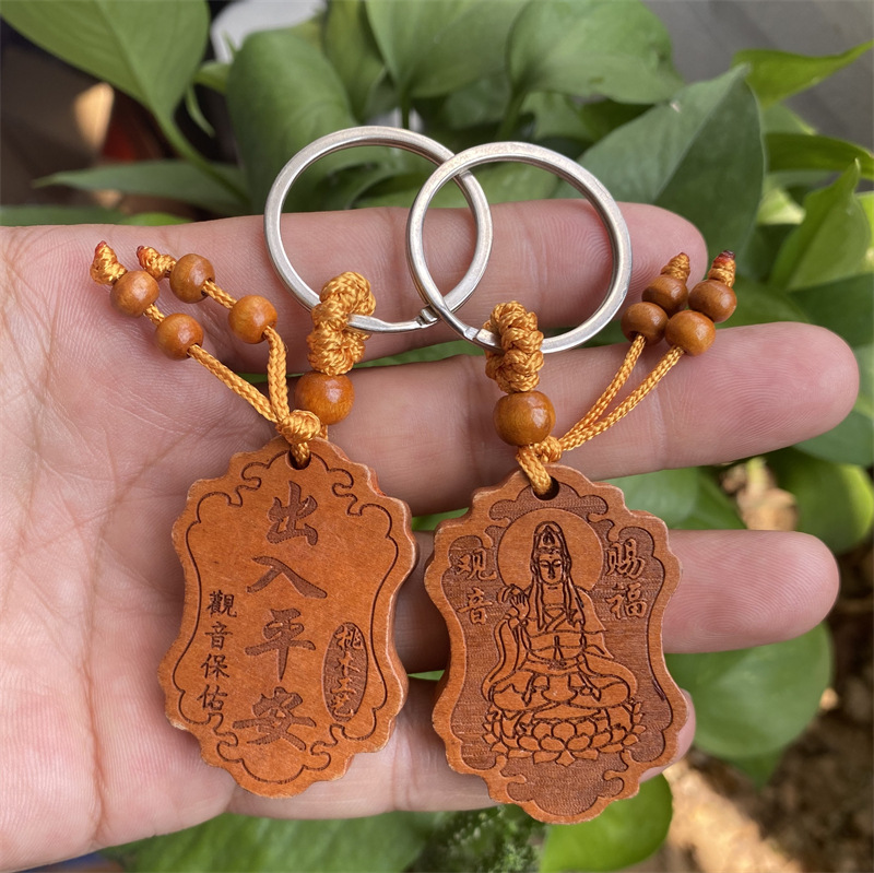 Peach wood square pillar diamond sutra keychain cylindrical heart sutra shurangama mantra key chain stall wholesale chattering live supply