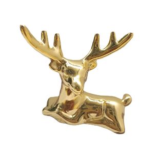 Simple golden metal deer ornaments, Model Room table