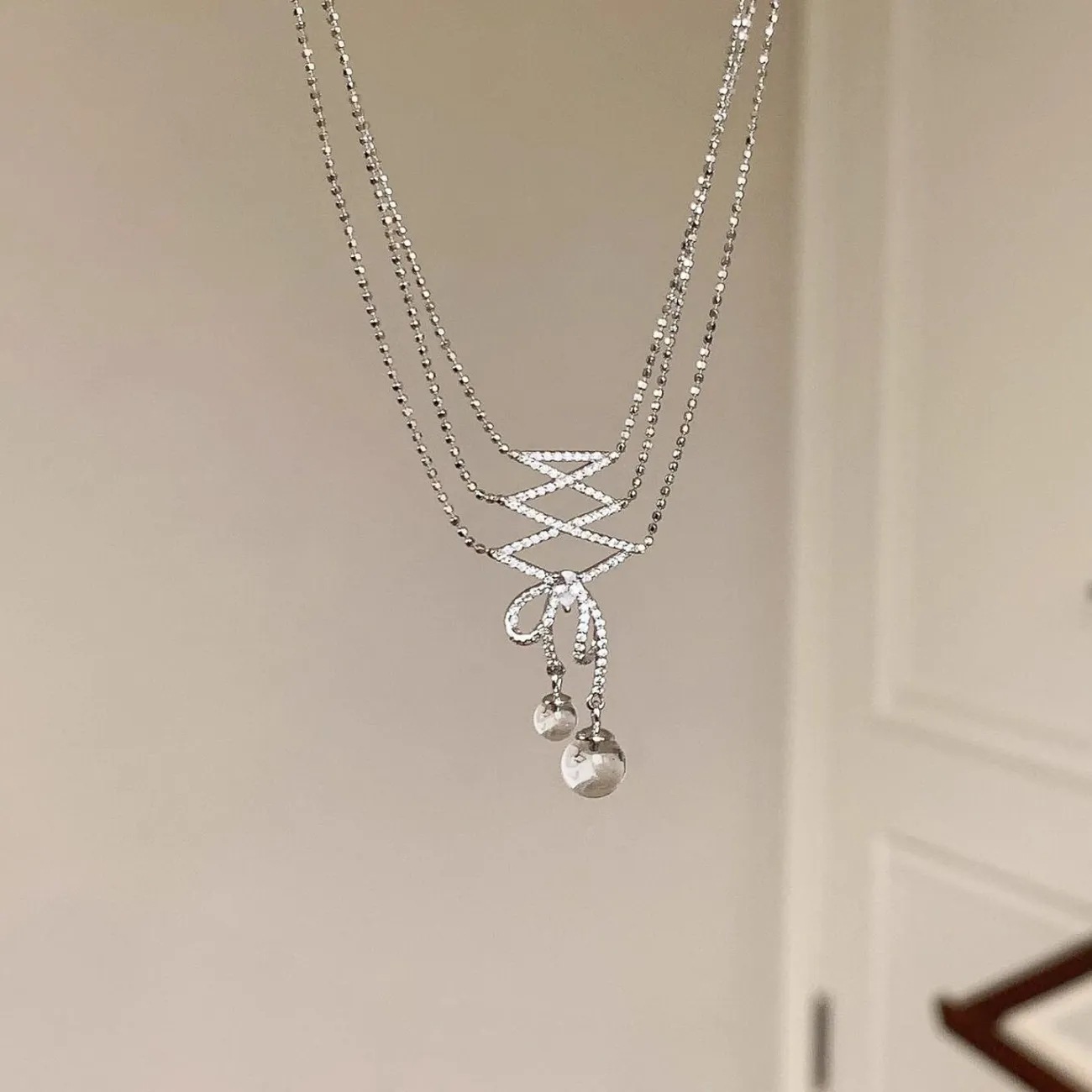 2025 New Ballet Ribbon Necklace Women's Niche Design Fashion White Crystal Bow Pendant Little Red Book Hot Style