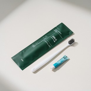 Disposable toothbrush hotel special toothpaste two-in-one soft film wash suit B & B hotel LOGO factory wholesale