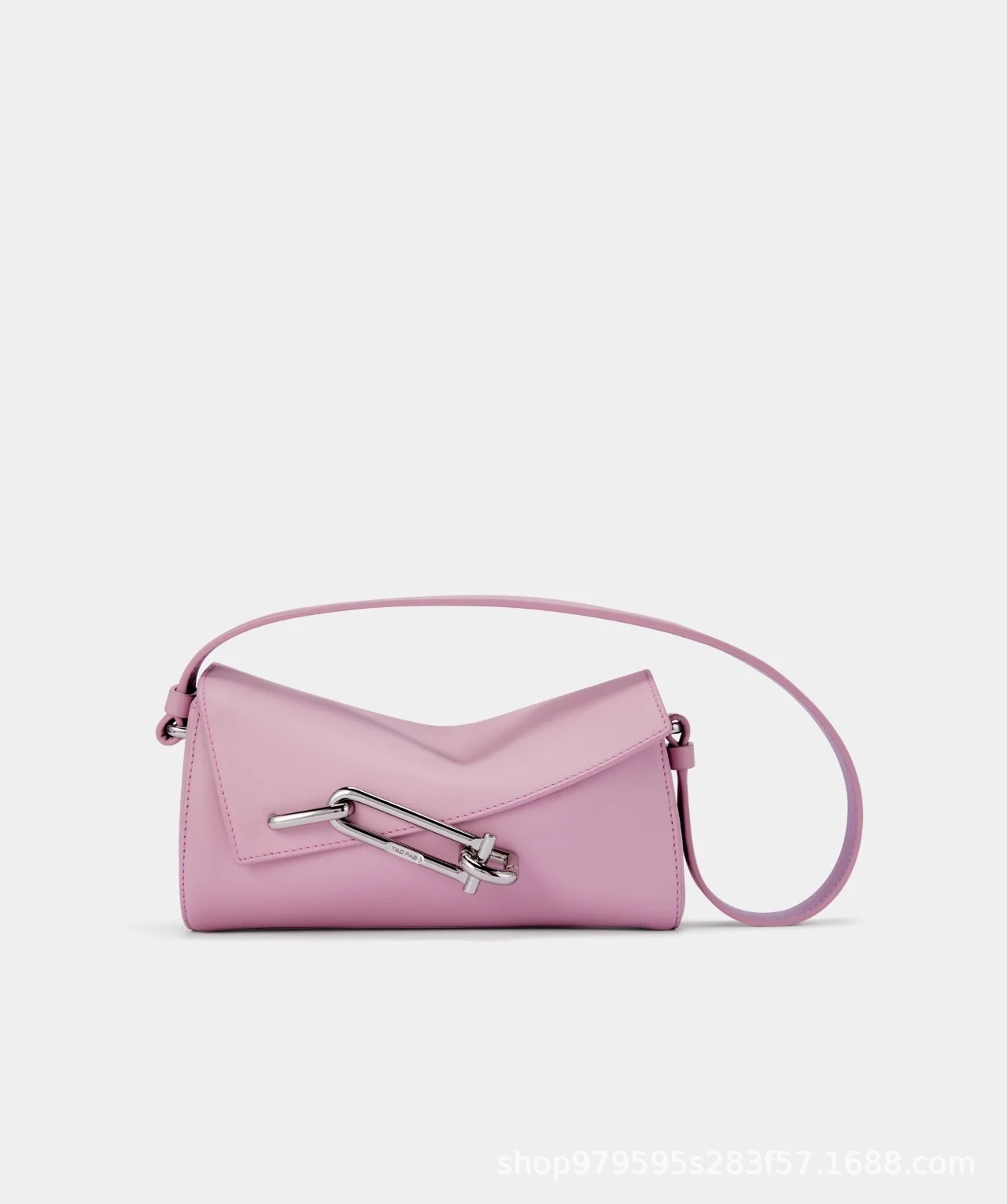 TADFAB's new INTERLOCK classic series mini lockbox bag in pink with a unique design.