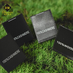 Spot WOOL WOOL CASHMERE CASHMERE Scarf Washable Label Black Background White Words Folded with Good Washable Label