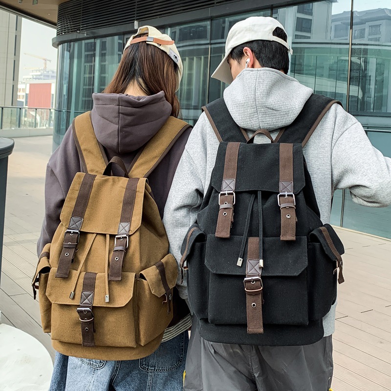 Retro outdoor canvas casual backpack for men and women, large capacity backpack for students, new style.