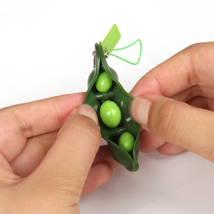 Cross-border extrusion Mao Dou squeeze music decompression unlimited extrusion pinch music pea pod keychain vent toys wholesale