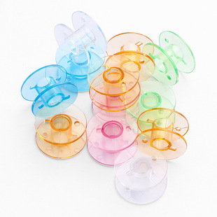 Factory wholesale color transparent plastic bobbin candy color line reel household bobbin multifunctional sewing machine spool