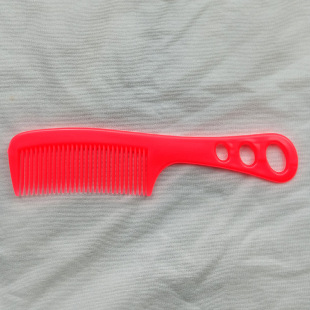 Small size pearl three-hole children's comb color with holes portable plastic cooked plastic comb two yuan store supermarket supply wholesale