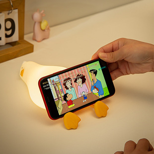 Cross-border lying flat duck turn over duck silicone night light duck light atmosphere light children's gift healing mobile phone holder
