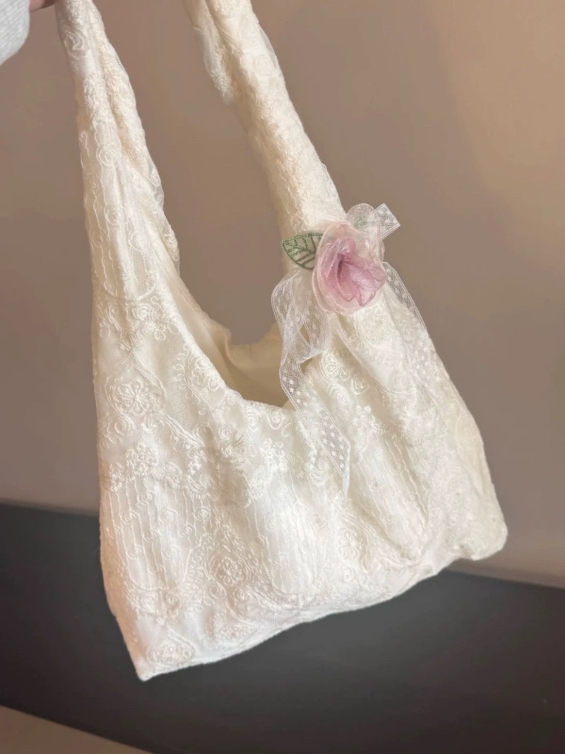 Korean style fresh and cute lace floral canvas bag for women, 2025 new style, large capacity, shoulder bag, commuter underarm bag.