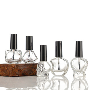 Wholesale personality 10ml 15ml skull transparent nail polish glass bottle mini cosmetic subpackaging spray