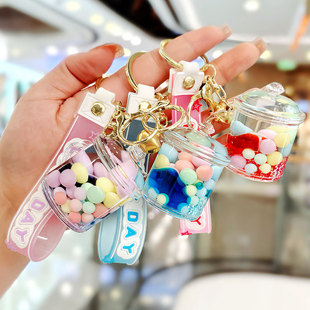 Oil tea cup key chain color beads floating liquid quicksand bottle acrylic car bag key chain pendant wholesale