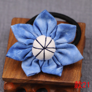 Lijiang Dali Yunnan fabric handmade tie-dyed blue dyed headdress flower leather rope children's headdress hair accessories retro travel gifts