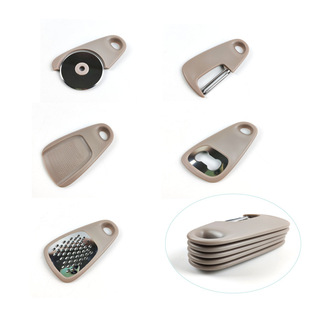 in stock Multifunctional Portable Five-in-One Kitchen Gadget Peeler Bottle Opener Garlic Grinder Cheese Shaver