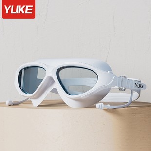 Adult swimming goggles waterproof anti-fog HD professional male and female large frame adult swimming glasses swimming cap wholesale