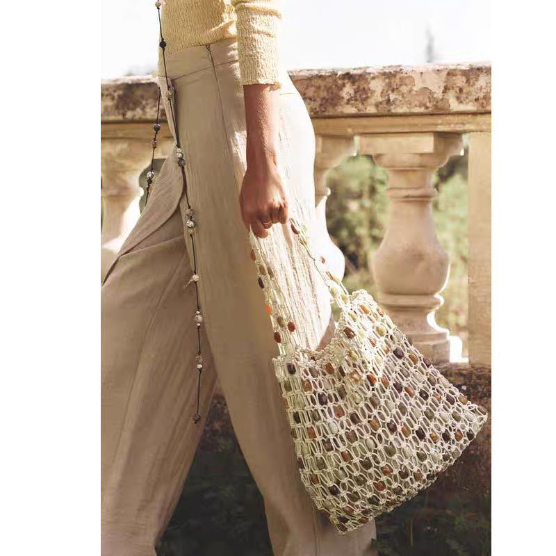 New summer casual beaded bag for women, fashionable niche high-end woven bag, plaid hollow wooden bead beach bag