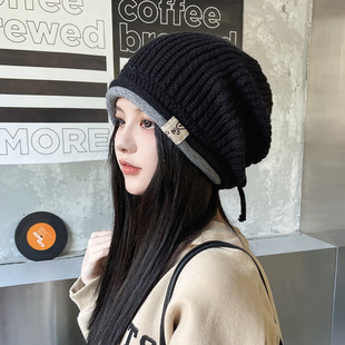 2024 Korean version of autumn and winter new hat female letter labeling drawstring knitted wool hat net popular small fresh baotou hat