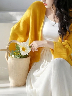 2025 early spring new super good-looking French fishing dating yellow white suspender dress with cardigan suit