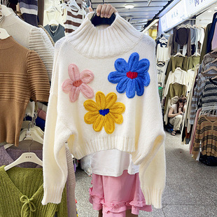 Fashion heavy-duty stitching three-dimensional flower elegant turtleneck long-sleeved sweater design loose short all-match top fashion