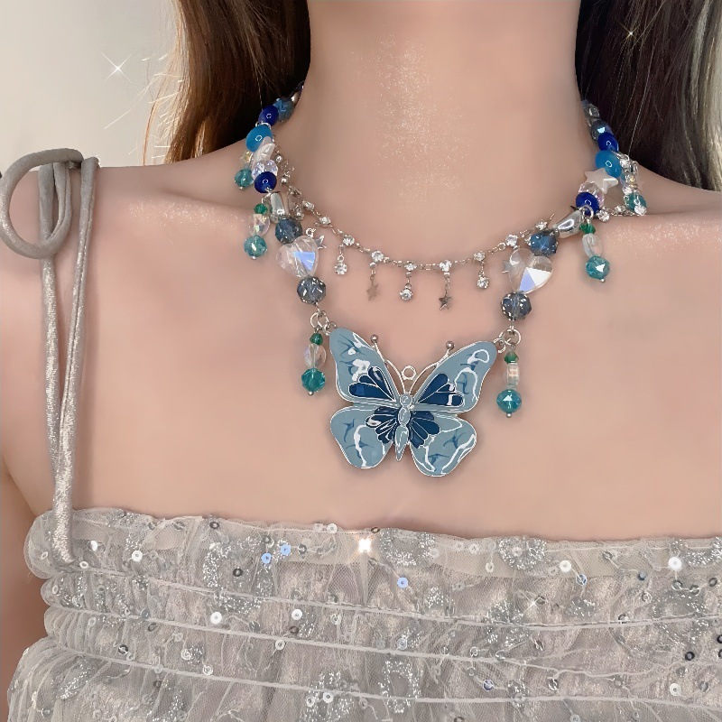 Blue beaded butterfly tassel necklace for women, 2024 new style, clavicle chain, understated luxury, niche design, high-end accessory.
