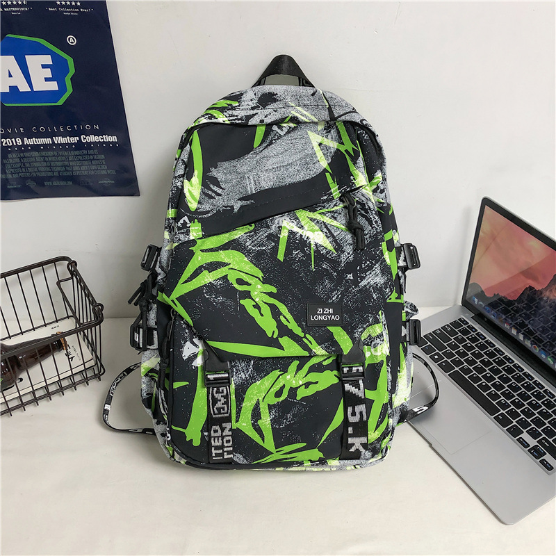 In-stock graffiti trendy backpack, lightweight sports bag, casual laptop backpack for college students, men and women, and junior high school backpack.