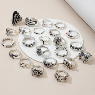 European and American cross-border dark exaggerated Diamond-embedded poker butterfly crying face frog organ retro alloy ring 23-piece set