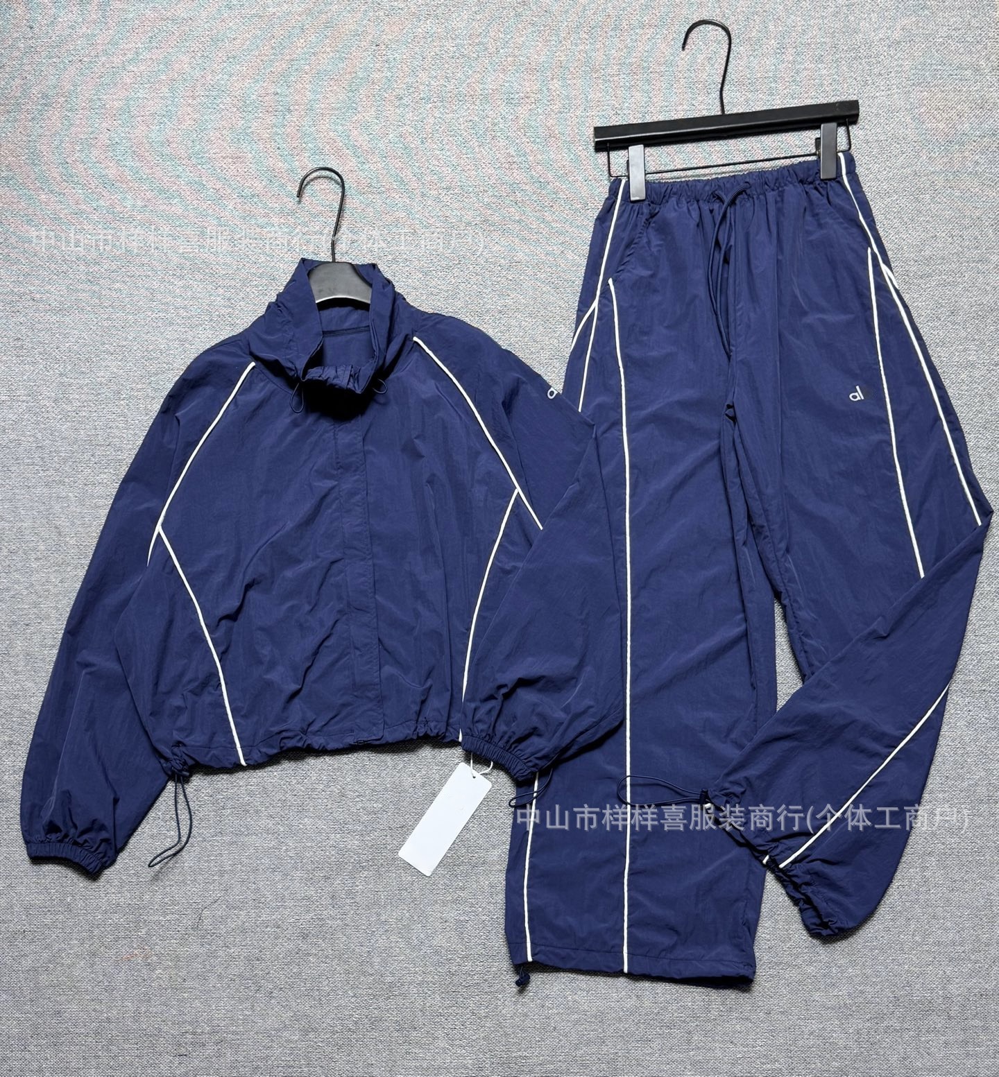 In-stock cross-border casual sports suit for women, fashionable color-blocked drawstring sports jacket and pants two-piece set