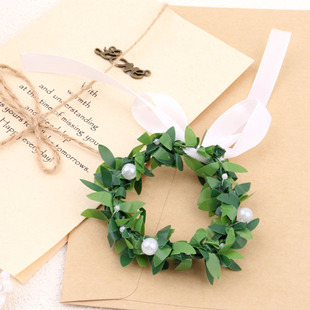 Cross-border Christmas flower rattan napkin ring wire green leaf wreath napkin buckle green rattan table home decoration