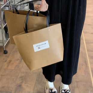 Kraft paper bag children's clothing store handbag clothing store non-side shopping bag simple paper bag hand bag in stock wholesale
