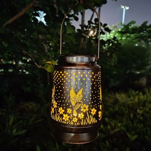 Cross-border solar LED outdoor waterproof lamp retro iron hollow courtyard lawn landscape hummingbird projection lamp