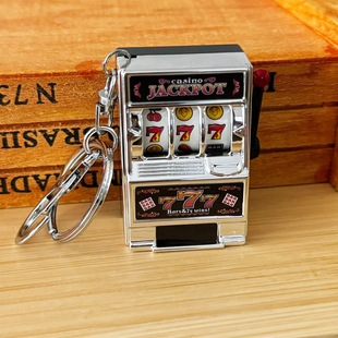 Creative playable mini fruit machine lottery machine turn to music game key chain luggage pendant simulation toys wholesale