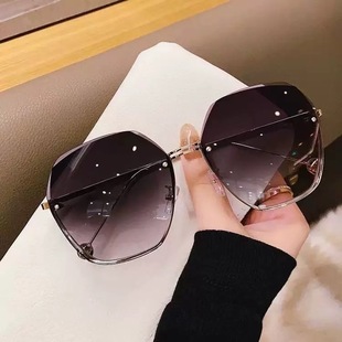 2025 new sunglasses women's frameless trimming sunglasses women's online popular anti-ultraviolet driving glasses round face trendy women