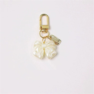 New acrylic diy bow rose flower keychain pearl tassel ladies key chain earphone bag pendant