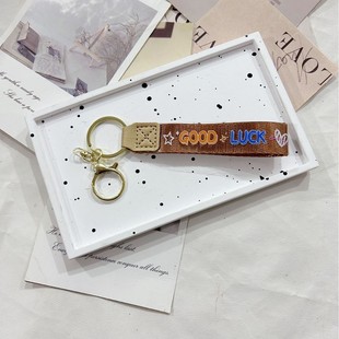 Creative kappi bala leather rope keychain accessories exquisite doll with bag pendant cute explosive accessories wholesale