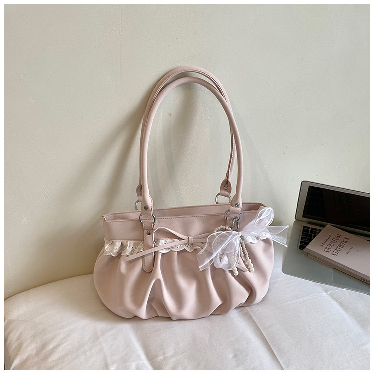 Sweet polka dot bow handbag for women, new summer 2026 style, everyday, unique, pleated, high-value crossbody bag.