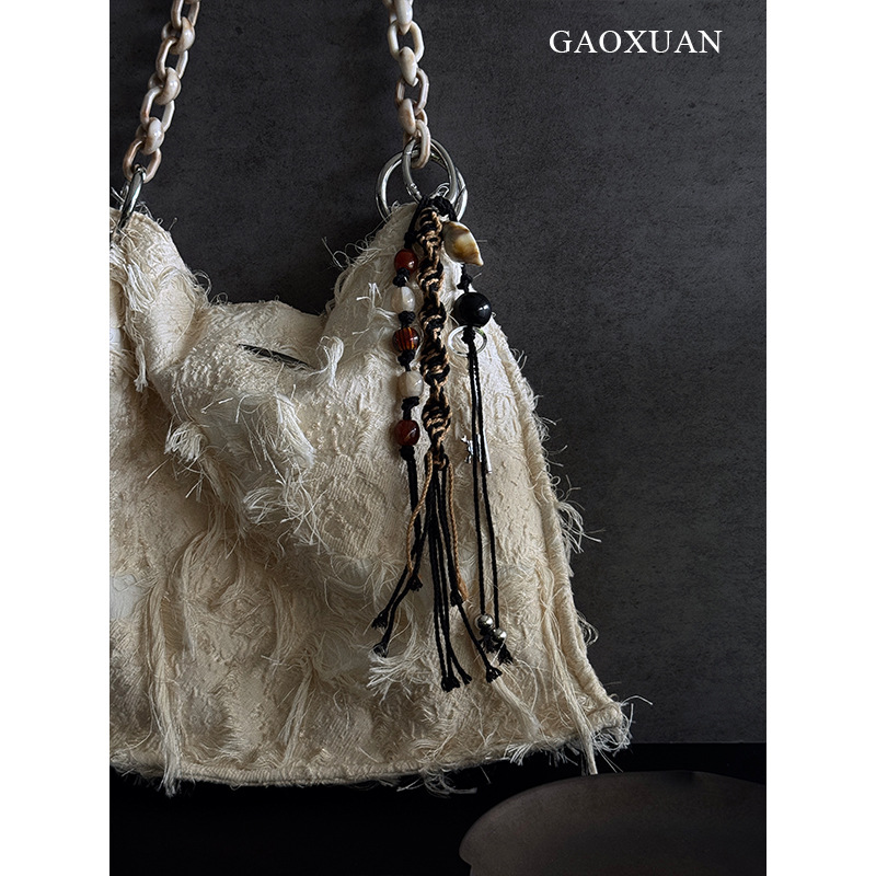 European and American cross-border retro ethnic style handmade wrapped woven bag pendant mobile phone chain mixed color beaded keychain