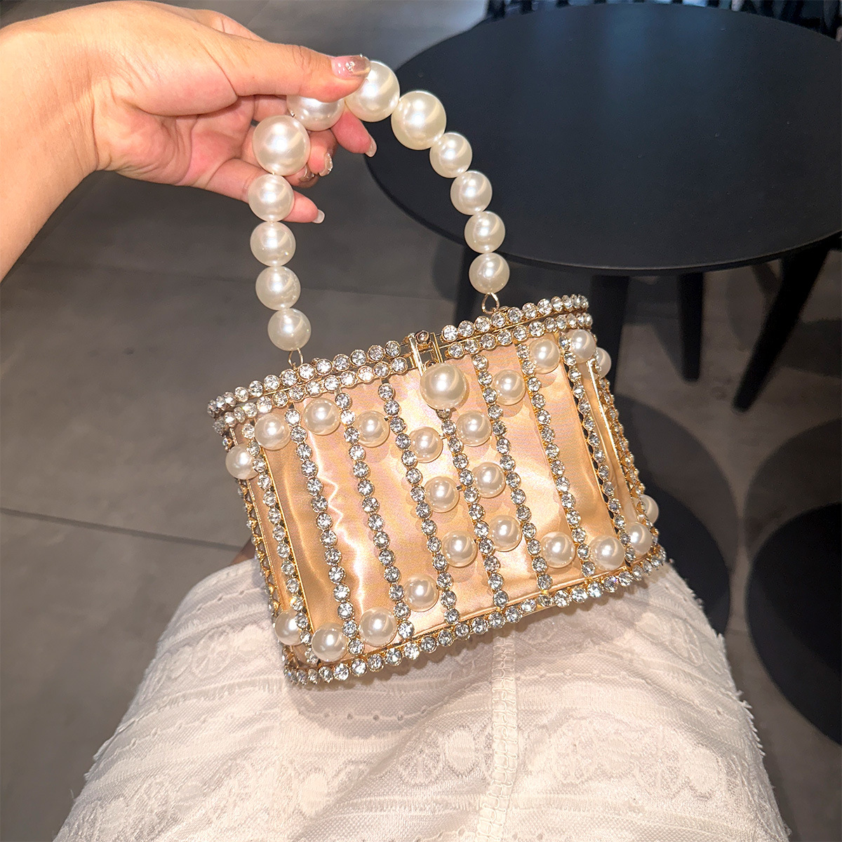 Cross-border popular diamond birdcage hollowed-out women's handbag, fashionable pearl evening bag, high-end chain basket bag