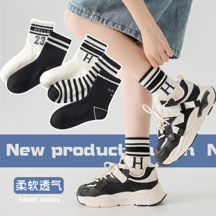 Cartoon children's socks summer mesh breathable black and white children's socks for men and women in the tube socks Korean version of Joker sports socks wholesale