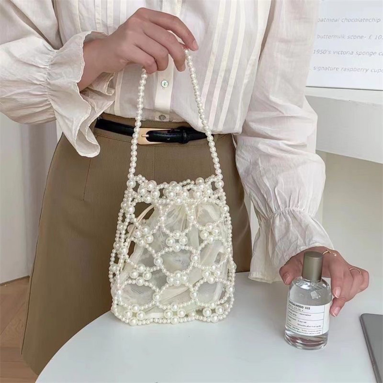 Niche handmade pearl beaded bags, vintage bucket bags, niche woven bags with openwork beads.