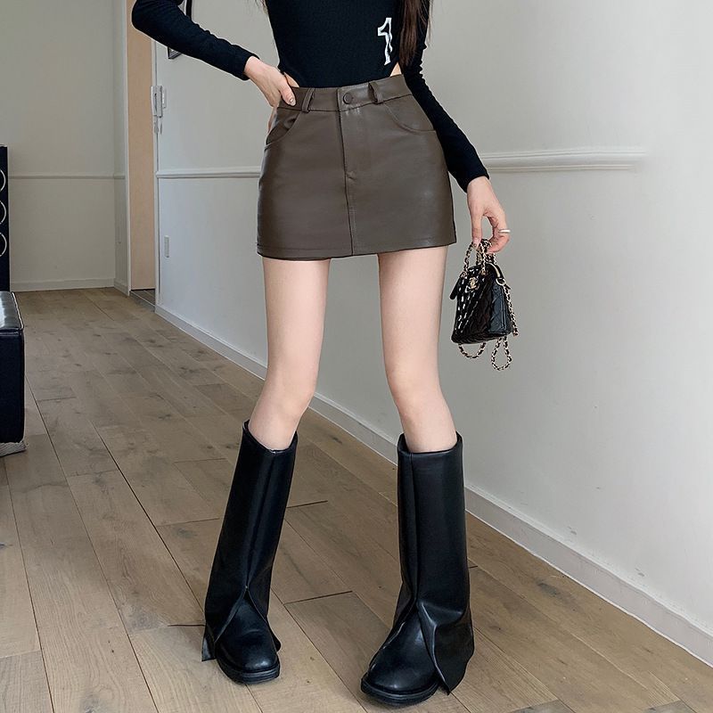 플러스 사이즈 통통녀 검은 PU 치마 향신료 소녀 미니스커트 가을과 겨울 새로운 높은 허리 질감 A 라인 엉덩이 스커트 바지 스커트