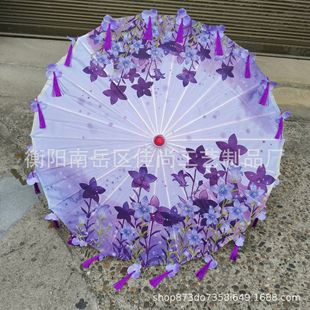 Scenic spot stall wholesale petal craft oil paper umbrella antique Chinese clothing tassel petal umbrella performance dance umbrella silk umbrella