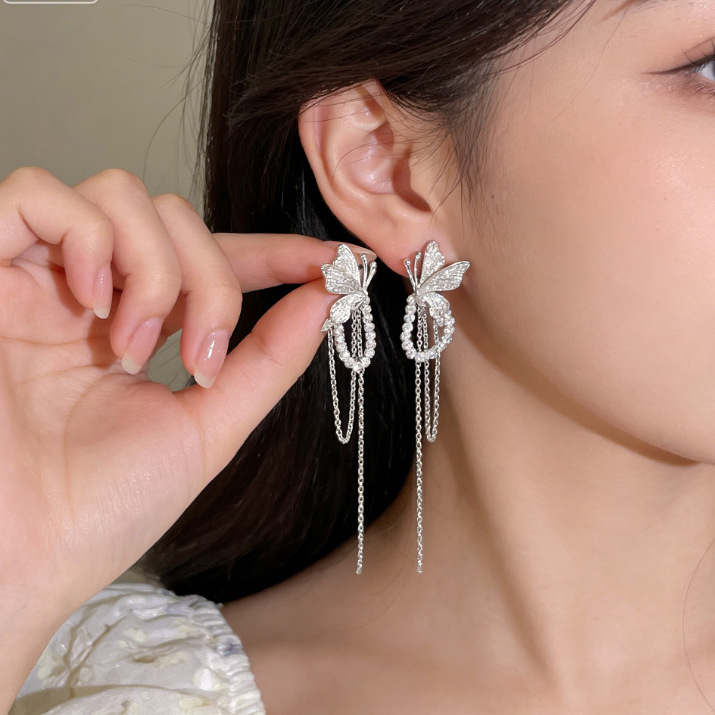 2026 Silver Butterfly Pearl Tassel Earrings for Women, High-End Light Luxury Niche Earrings, Vacation Style Bowknot Ear Accessories