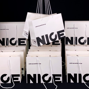 Ins style simple white clothing tote bag in stock wholesale fashion high-end shopping bag paper bag custom logo