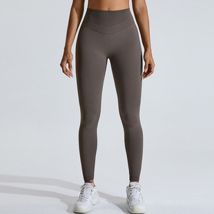 European and American seamless Peach Hip lifting yoga pants women's V arc high waist tights outdoor running sports fitness pants