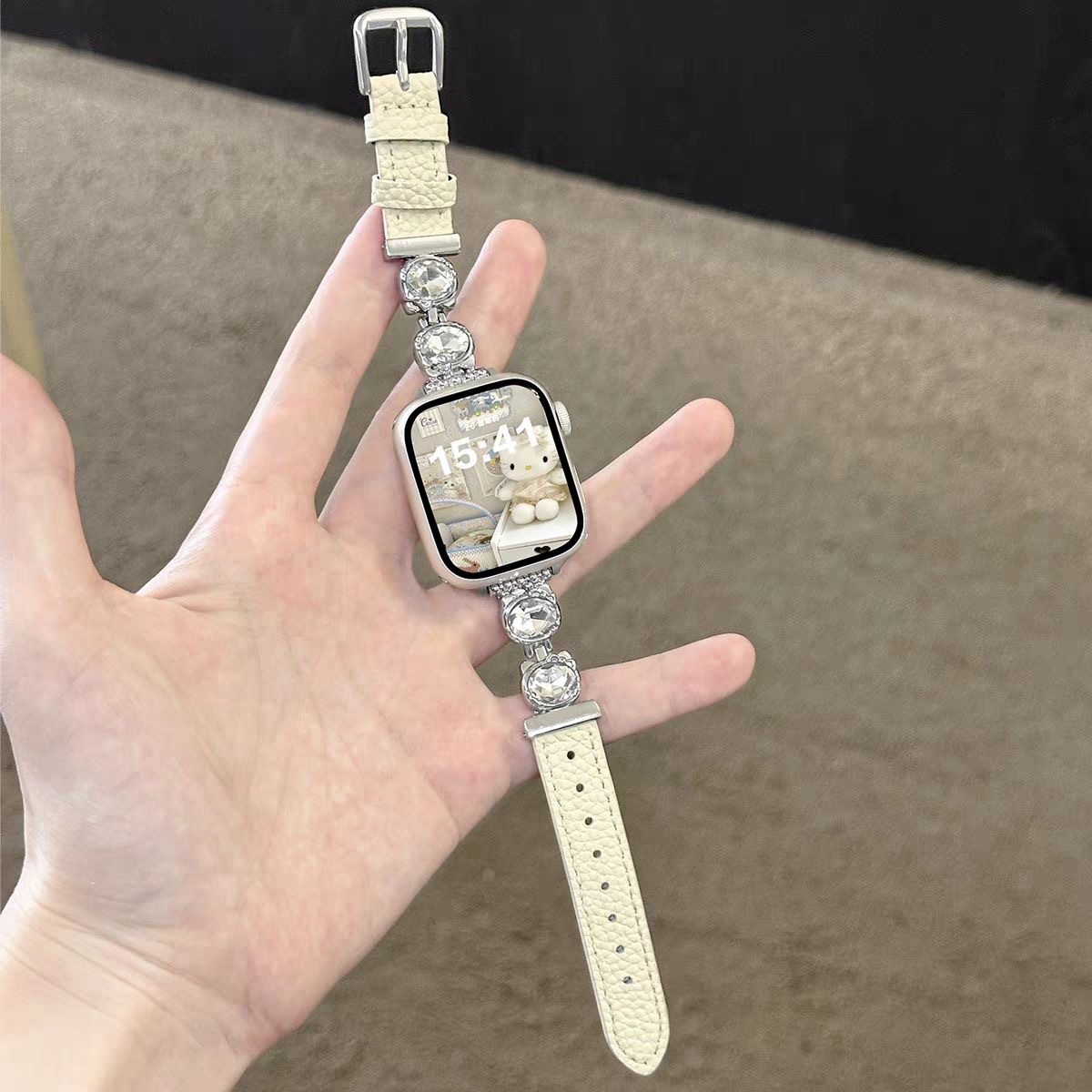 Slim cartoon Hello Kitty zircon-embellished leather strap for Apple Watch Series 10 and iWatch Series 9s8 (Lychee-textured genuine leather).