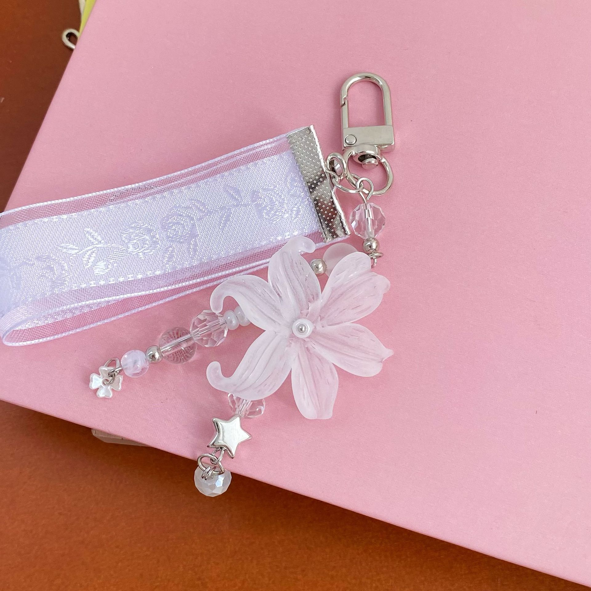 Frosted iris crystal sweet ribbon phone chain, girly ballet style, spring rose flower Korean pendant